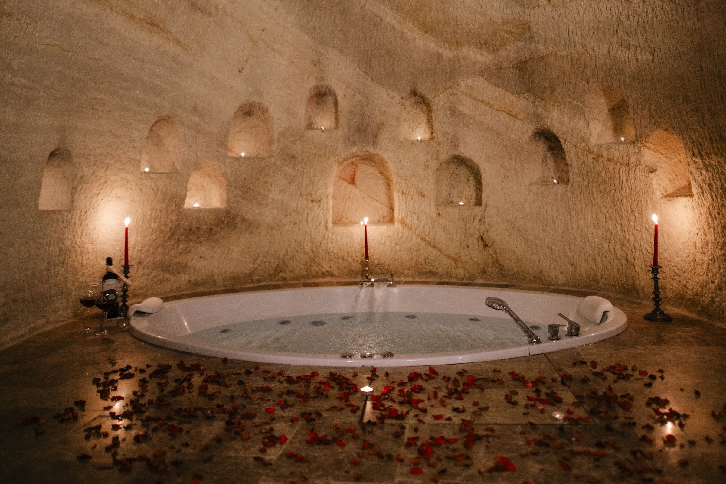 The Honeymoon Suite — carved stone walls in candlelight